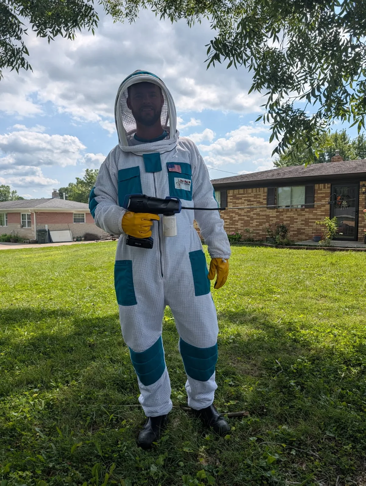 Bugz Bug Me technician safely removing hornet nest in Fairland, Indiana